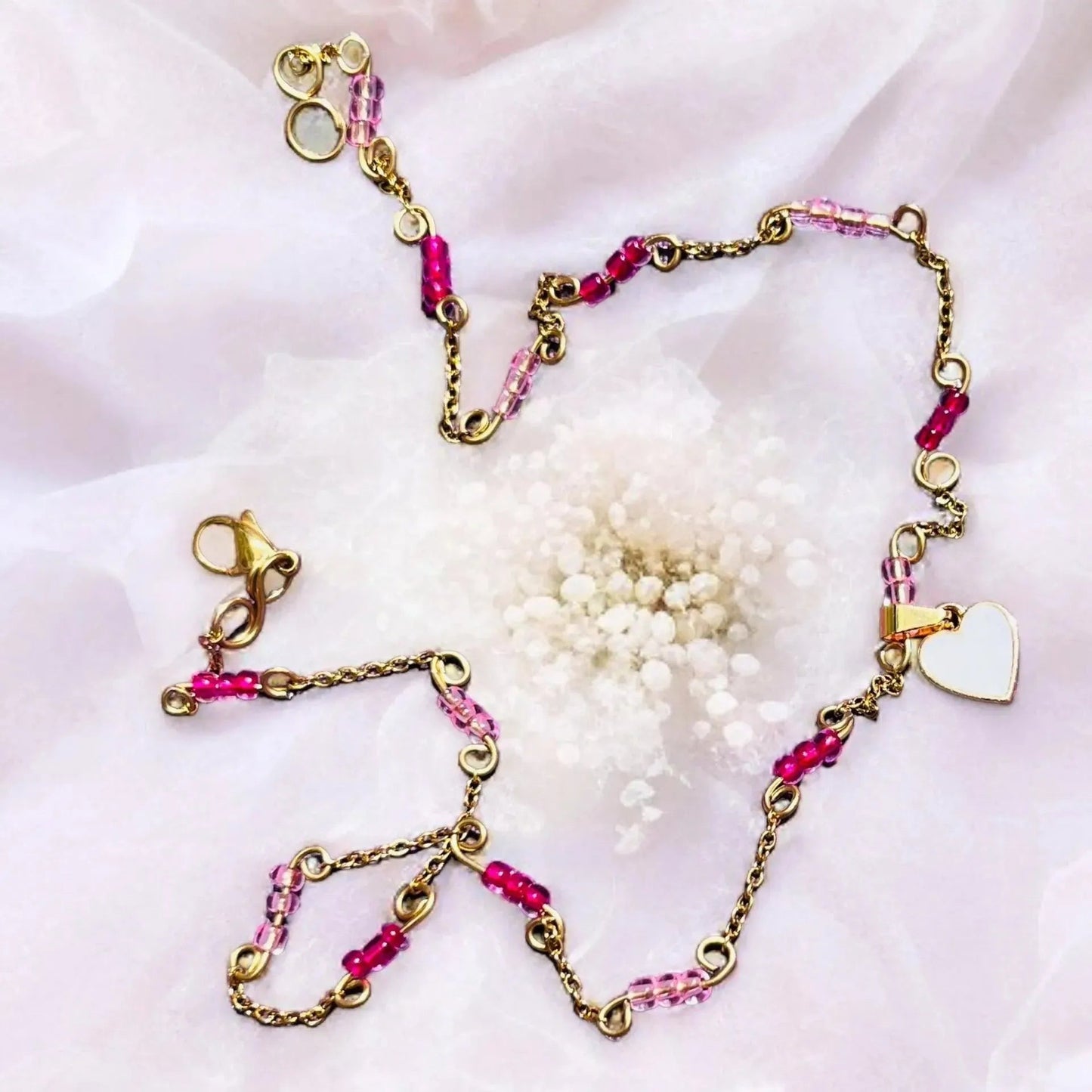 Necklace with a pink heart - R66