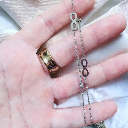 Silver necklace made of surgical steel - length 50 cm, decorated with eights and stones infinity necklace with stones silver 1000937