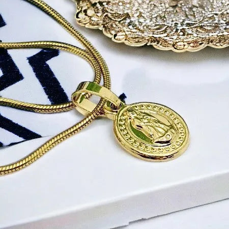 Gold surgical steel pendant | Dimensions 1 x 1.5 cm | Chain 50 cm (length can be chosen)
Virgin Mary R0015