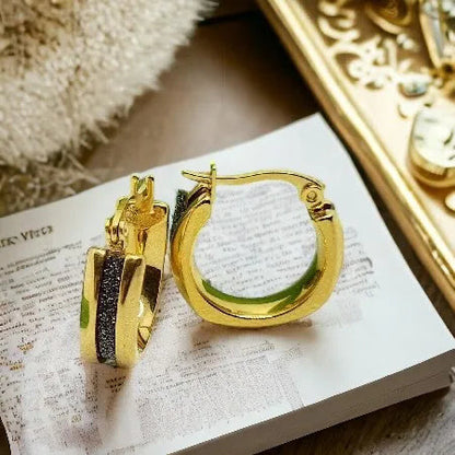 Gold earrings made of surgical steel with black stones - nickel-free earrings decorated with black stones NA1