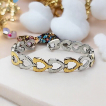 Heart Embrace – silver and gold bracelet with hearts