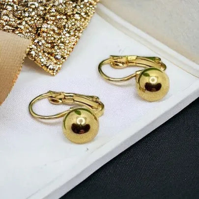 Golden earrings made of surgical steel - elegant and durable jewelry children's earrings balls 21031302