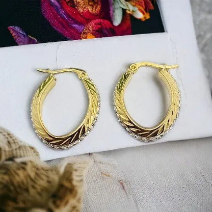 Zlaté náušnice z chirurgickej ocele – 2,5 x 2 cm, zdobené kamienkami

náušnice Jana N0026