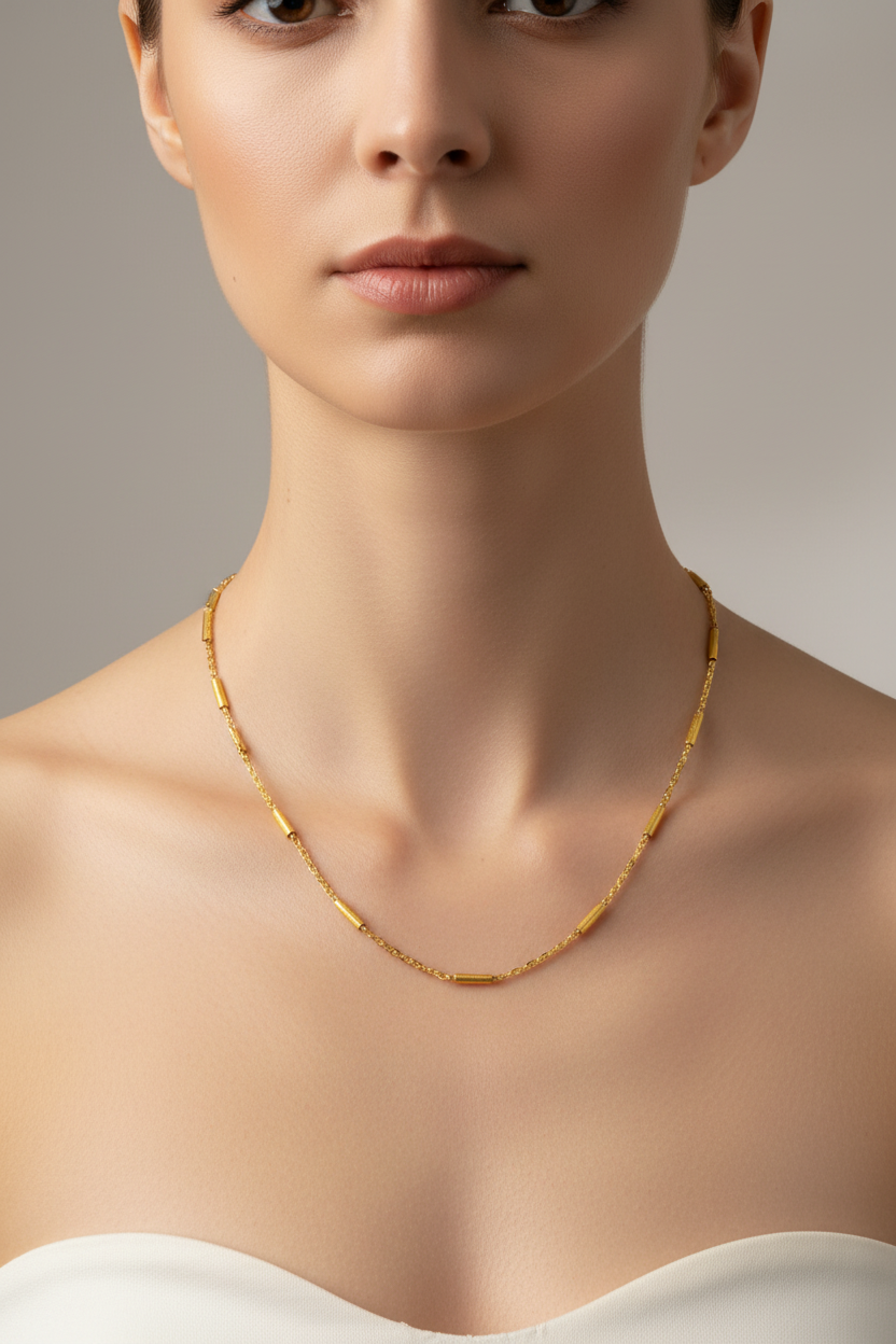 Zlatá retiazka z chirurgickej ocele s dekoratívnymi valčekmi – Harakka Jewls