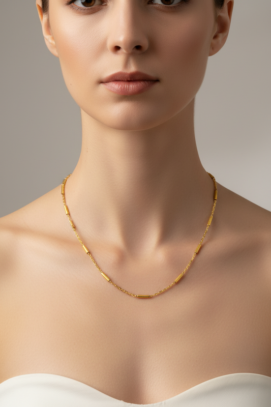 Zlatá retiazka z chirurgickej ocele s dekoratívnymi valčekmi – Harakka Jewls