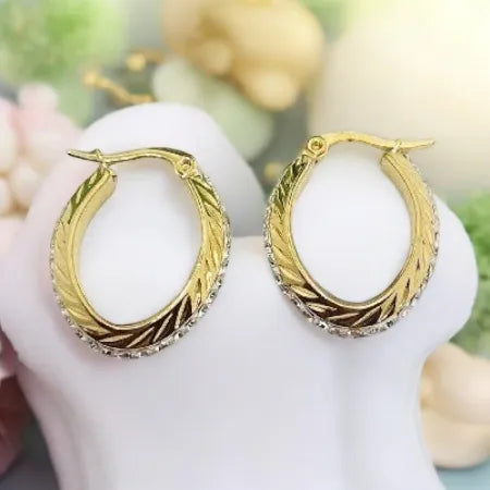 Golden earrings made of surgical steel - 2.5 x 2 cm, decorated with rhinestones

 earrings Jana N0026