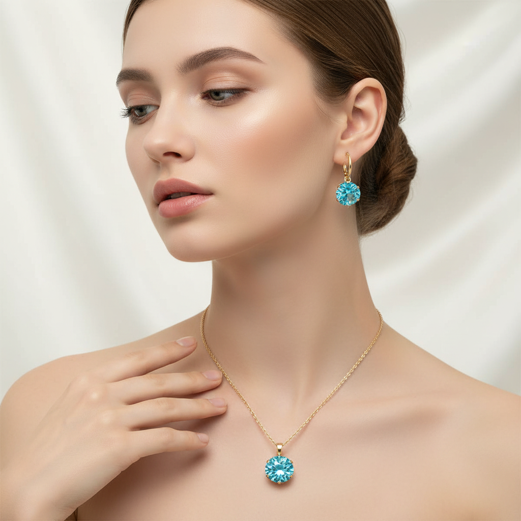 Zlatý set z chirurgickej ocele s modrým kameňom – náhrdelník a visiace náušnice Harakka Jewls