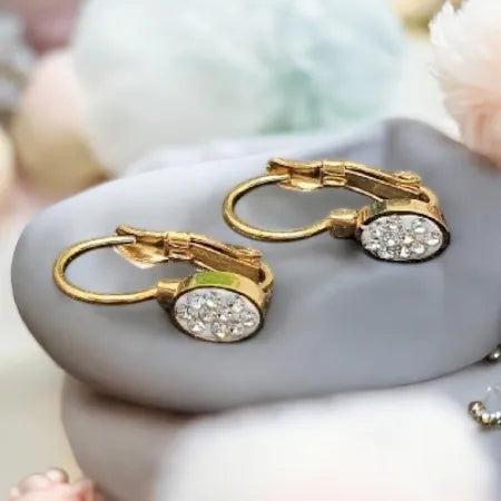 Gold earrings made of surgical steel - with colored stones children's earrings oval inlaid with white stones gold N0002