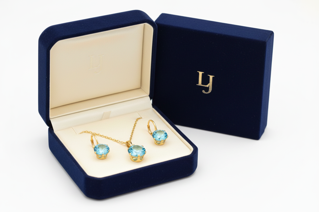 Zlatý set z chirurgickej ocele s modrým kameňom – náhrdelník a visiace náušnice Harakka Jewls