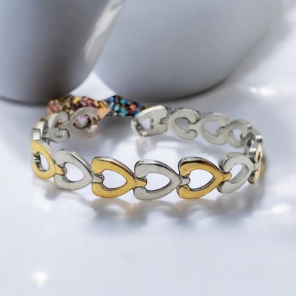 Heart Embrace – silver and gold bracelet with hearts