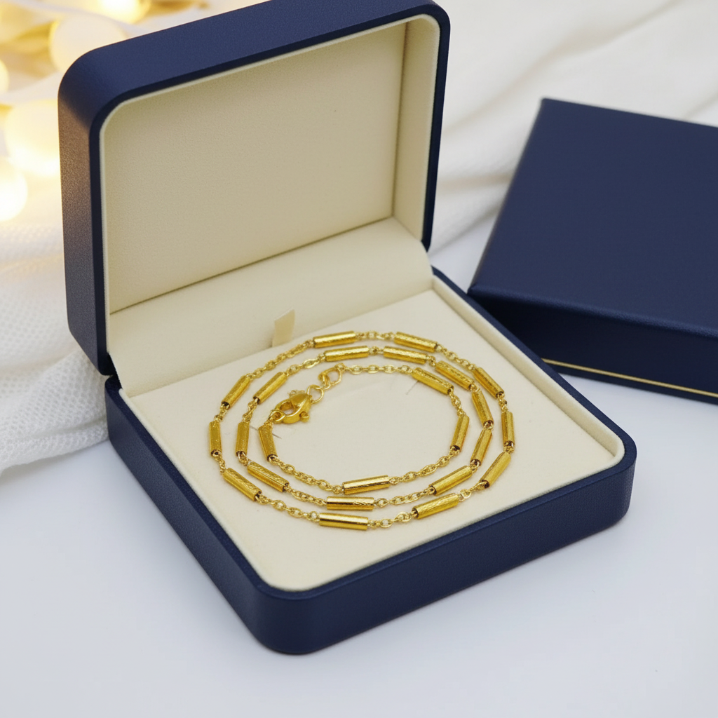 Zlatá retiazka z chirurgickej ocele s dekoratívnymi valčekmi – Harakka Jewls