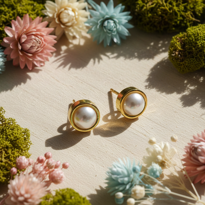 Harakka nature flat lay gold pearl earrings