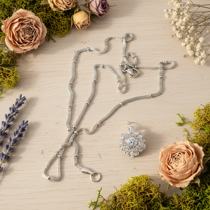 Harakka nature flat lay silver mesh ball lariat necklace