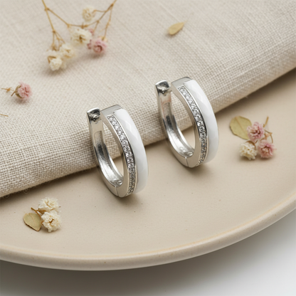 Harakka silver ceramic zirconia hoop earrings flat lay
