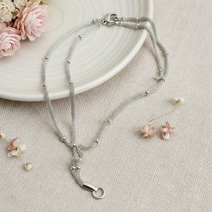 Harakka silver mesh ball chain lariat necklace flat lay